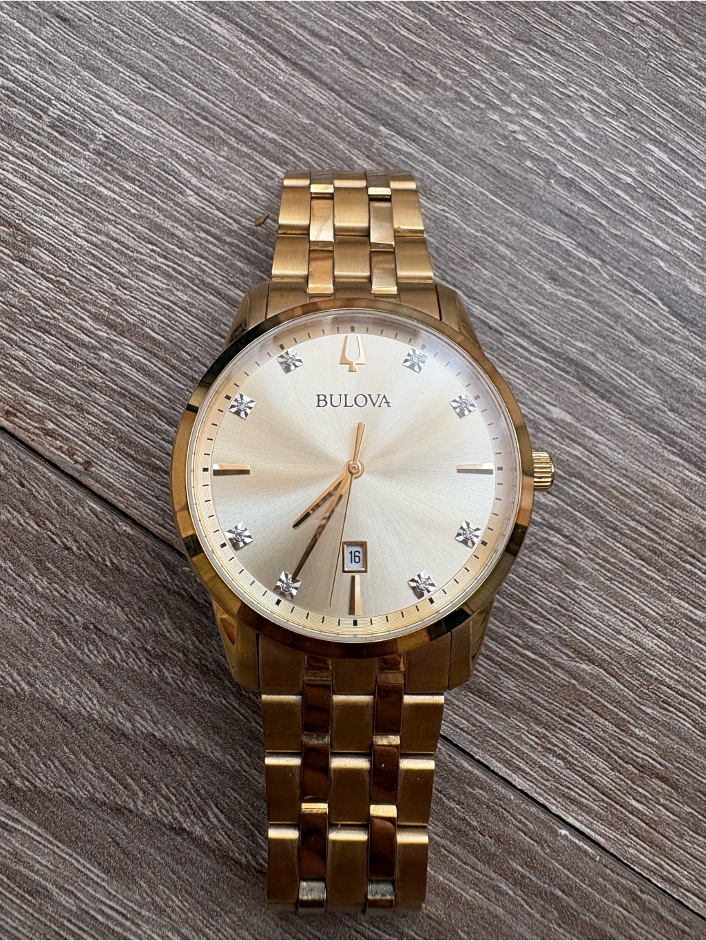 Bulova Gold Tone Watch With Champagne Dial And Crystal Accents